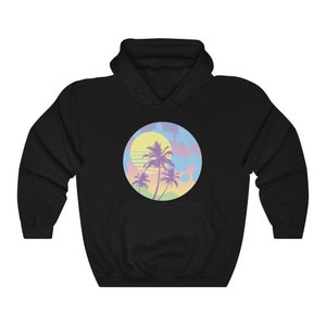 May include: Black hooded sweatshirt with a graphic of a sunset with palm trees in a circle. The sunset is in pastel colors of pink, blue, yellow, and green.