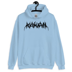 May include: A light blue hoodie with a black graphic of the word "KALIFORNIA" in a stylized metal font.