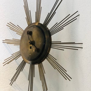 Mechanical clock in the shape of the sun, 1960s