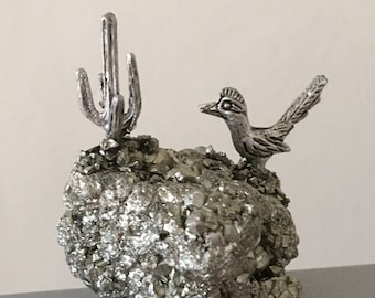 Rare vintage silver coloured bird & cactus on pyrite crystal base.