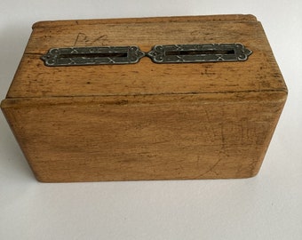 Antique wooden double slot token/money box .