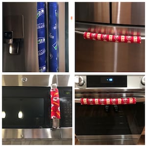 May include: Four images showing oven and refrigerator handles with fabric covers. The covers are red and feature the San Francisco 49ers logo and the Seattle Seahawks logo. The covers are designed to protect the handles from heat and scratches.