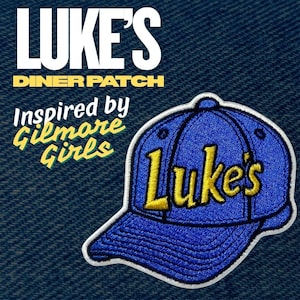 May include: Embroidered patch featuring a blue baseball cap with the word "Luke's" in yellow. The patch is inspired by the TV show "Gilmore Girls" and includes the text "Luke's Diner Patch".
