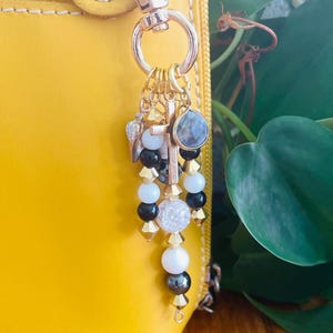 Black, White and Gold Christian Bag Charm | Gold Cross Purse Dangle | Christian Keychain | Shell Charm | Beaded Accessory Gift for Her