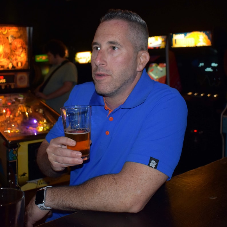 royal blue and orange polo shirt