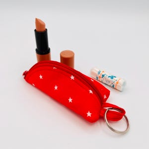 Kleine rote Tasche für Lippenstifte mit Sternen Schlüsselanhänger