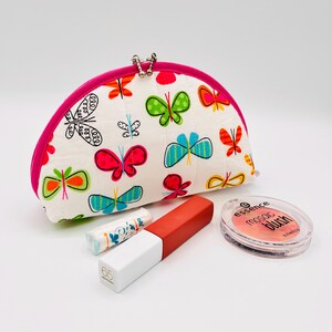 Piccola trousse bianca con farfalle