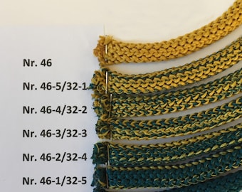 May include: A close-up of seven different cord samples, each with a different color combination of yellow and green. The cords are labeled with numbers, starting with "Nr. 46" and ending with "Nr. 32".