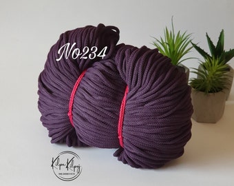 May include: Two spools of dark purple cotton cord, labeled "No234".