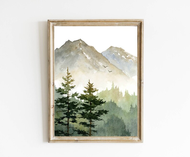 May include: A watercolor painting of a mountain landscape with two pine trees in the foreground. The mountains are a light gray and blue, and the trees are a dark green. The sky is a light blue.