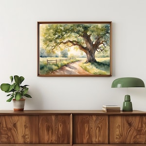 Puede incluir: Pintura acuarela de un gran &aacute;rbol con un camino sinuoso que conduce a &eacute;l. El &aacute;rbol est&aacute; en el centro de la pintura y tiene un tronco y ramas gruesas. El camino est&aacute; bordeado por una valla de madera y conduce a un campo de hierba verde. La pintura est&aacute; enmarcada en un marco marr&oacute;n.