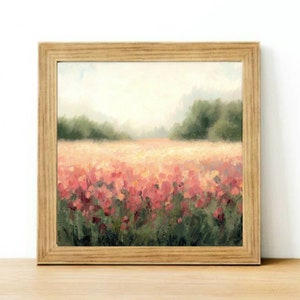 May include: A framed painting of a field of pink flowers with a blurred background of trees and a hazy sky.