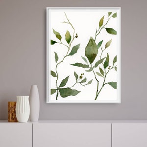 Puede incluir: Una pintura de acuarela de hojas verdes y ramas sobre un fondo blanco. Las hojas est&aacute;n pintadas en tonos de verde, con algunas hojas que tienen un color verde m&aacute;s vibrante que otras. Las ramas son delgadas y delicadas, y est&aacute;n dispuestas de una manera que crea una sensaci&oacute;n de movimiento y flujo.
