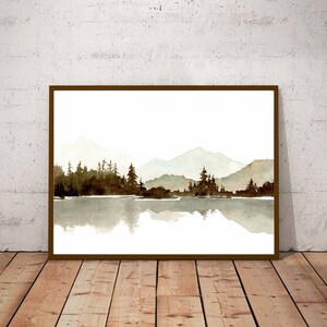 May include: A watercolour painting of a mountain range reflected in a still lake. The mountains are a light grey colour, and the lake is a light blue colour. The trees are a dark green colour and are silhouetted against the mountains.