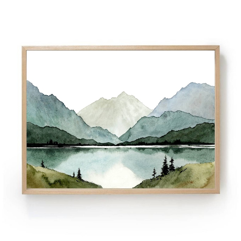 May include: A watercolor painting of a mountain range with a lake in the foreground. The mountains are painted in shades of blue and green, and the lake is a light blue. There are a few trees on the shore of the lake.