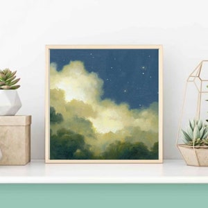 May include: A framed painting of a night sky with clouds and stars. The clouds are a light yellow color and the sky is a dark blue. The painting is in a wooden frame.