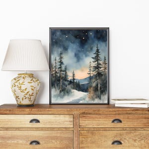 May include: A watercolor painting of a snowy forest scene with a dark blue sky and stars. The trees are silhouetted against the sky, and there is a path leading into the forest.