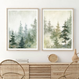 Puede incluir: Dos pinturas de acuarela enmarcadas que representan una escena de bosque con &aacute;rboles verdes y un fondo brumoso.
