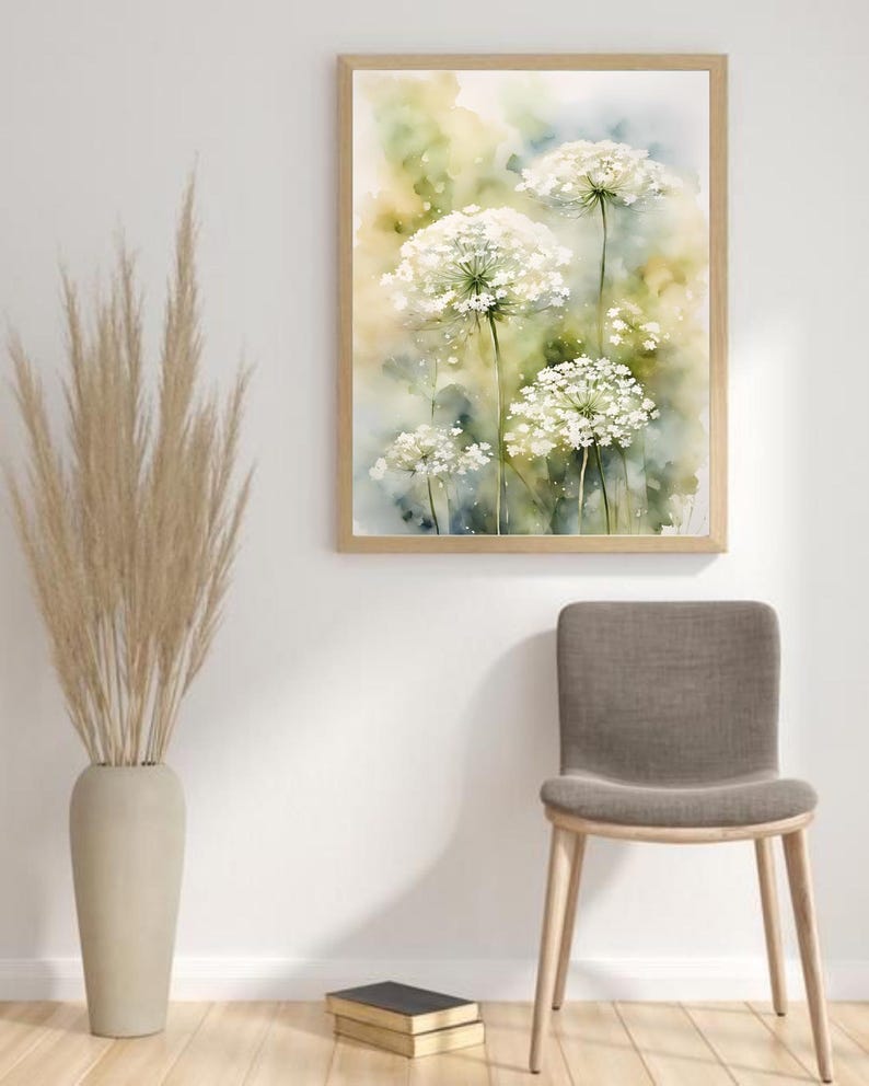 May include: A watercolour painting of white Queen Anne's Lace flowers with green stems and leaves against a soft yellow and blue background.