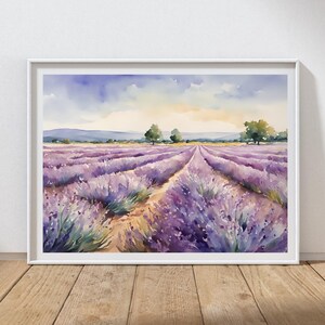 May include: Watercolor painting of a lavender field with two trees in the distance. The field is a vibrant purple with a dirt path leading through the center. The sky is a soft blue with white clouds.