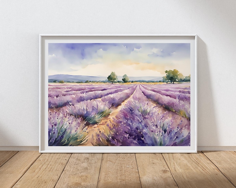 May include: Watercolor painting of a lavender field with two trees in the distance. The field is a vibrant purple with a dirt path leading through the center. The sky is a soft blue with white clouds.