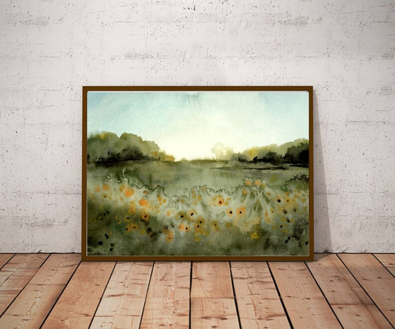 May include: A watercolor painting of a landscape with a field of yellow flowers in the foreground, a body of water in the middle ground, and a line of trees in the background. The sky is a light blue with a hint of orange in the distance.