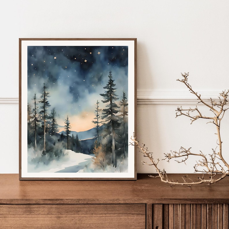 May include: A watercolor painting of a snowy forest scene with a dark blue sky and a few stars. The trees are silhouetted against the sky, and there is a path leading into the forest.