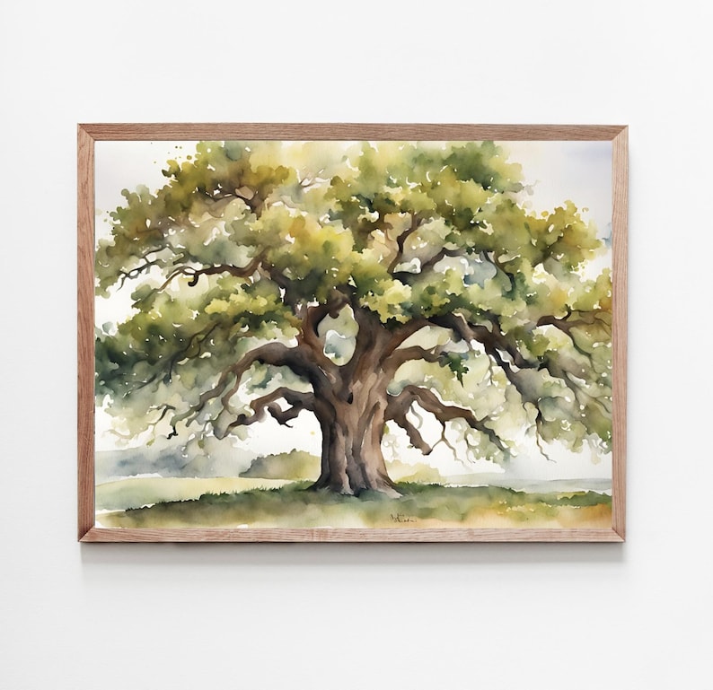 May include: Watercolor painting of a large oak tree with a wide canopy and sprawling branches. The tree is in a wooden frame. The leaves are shades of green and yellow, and the trunk is brown. The background is a soft, hazy landscape.