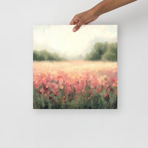 May include: A painting of a field of pink flowers with a hazy background of trees and a light blue sky.
