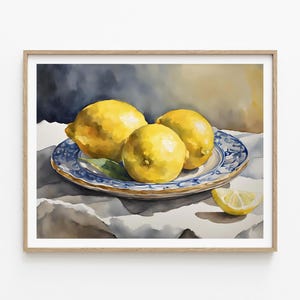 May include: Watercolor painting of three yellow lemons on a blue and white patterned plate. The lemons are arranged in a cluster, with one lemon partially overlapping another. The plate is on a white tablecloth.