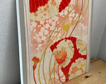 Wooden canvas made from antique kimono, flowers and a folding fan