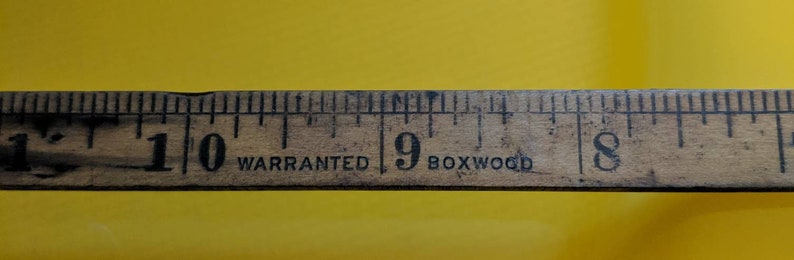 Vintage Stanley wood folding ruler number 68 A Unfolds to 24 made in USA Wood and brass.