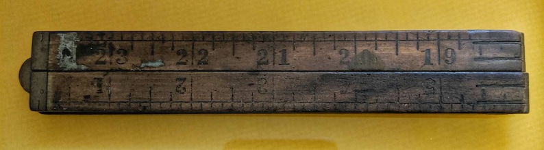 Vintage Stanley wood folding ruler number 68 A Unfolds to 24 made in USA Wood and brass.