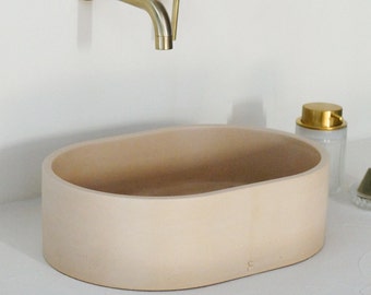 Oval concrete sink