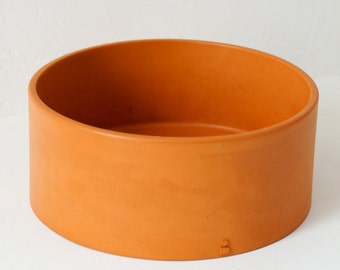 Orange concrete hand washbasin