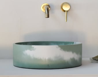 Round basin in green marbled concrete