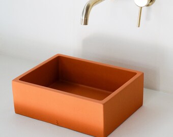 Orange concrete sink