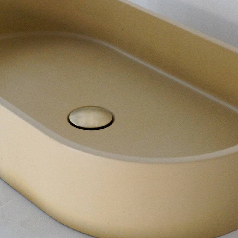 Beige oval concrete sink image 2