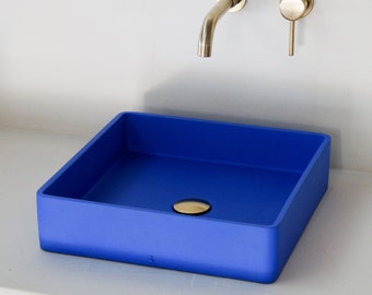 square blue concrete sink