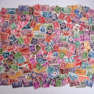 vintage US postage stamps from the 1940s and 1950, more than 200, used off paper, duplicates