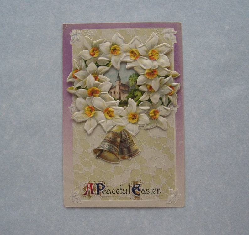 1913 A Peaceful Easter post card with additional layer cut out attached antique Easter Postcard flowers and bells addressed but unmailed