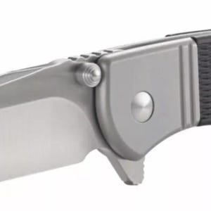 May include: A silver folding knife with a black handle featuring a textured pattern and a logo. The blade is partially open and has a curved edge.