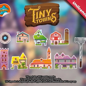 May include: A set of colorful Tiny Towns game pieces, including houses, a well, a tower, a hammer, and a sign that says "feafro".