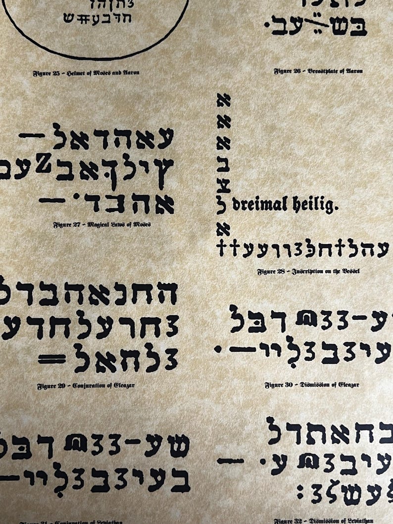 May include: A close-up of a page from a book with black text on a beige background. The text is in Hebrew and German. The text includes the words "dreimal heilig" and "Magical Laws of Moded".