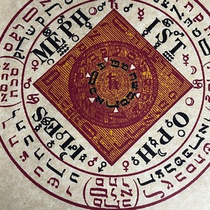 May include: A red and gold seal with the text "Meph" and "Ist" in a circle around a central square. The text "Figure 113 - Seal of Mephistophiles" is below the seal.