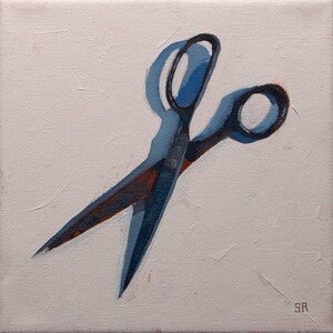 May include: An oil painting on canvas depicting a pair of open scissors. The scissors are rendered in shades of dark blue and deep rust-orange, set against a textured, off-white background. The initials SR are visible in the bottom right corner.