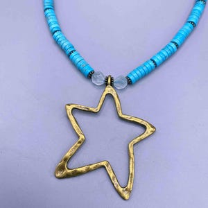 Handmade Turquoise Necklace: Bronze Star Pendant with Blue Topaz