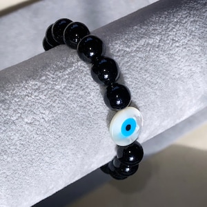 Evil Eye Bracelet: Mother of Pearl, Onyx, and Quartz Gemstone Protection