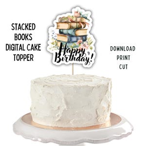 May include: A white frosted cake on a white cake stand, topped with a digital cake topper. The topper features a stack of books, flowers, and the words "Happy Birthday!" in black script. Text on the left says "Stacked Books Digital Cake Topper".