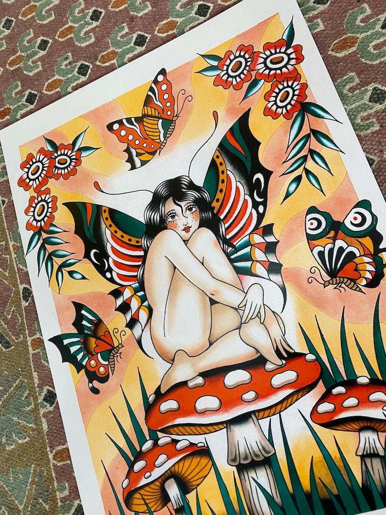 May include: A colorful illustration of a fairy with butterfly wings sitting on a mushroom. The fairy has long black hair and is wearing a green and red butterfly wing costume. The background is a yellow and orange sunset with green grass and red flowers.